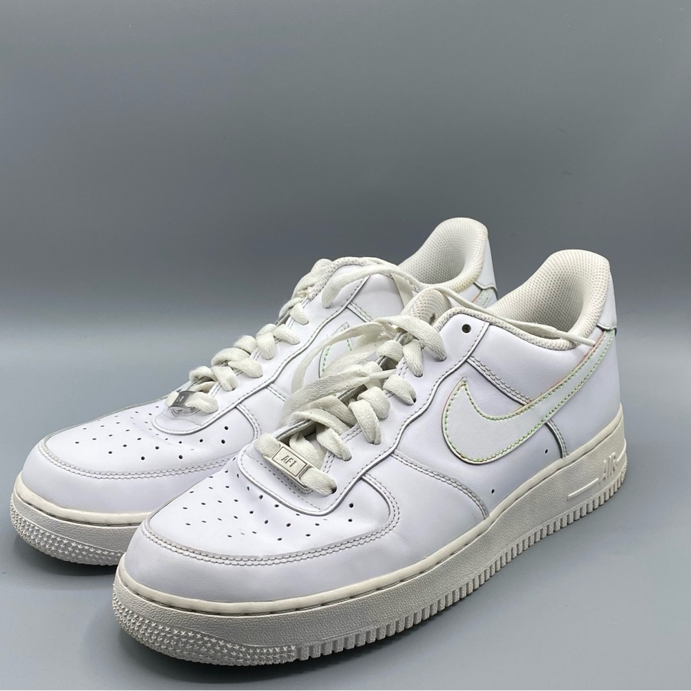 Nike Air Force 1 Low White (has green and pink lining around the Nike sign)​